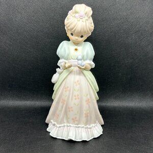 Precious Moments "Charity Begins In The Heart" figurine